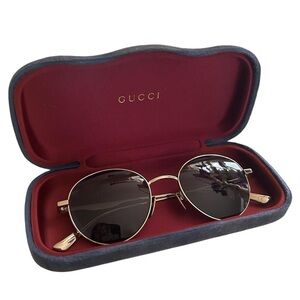 Gucci Elegant Gold Frame Sunglasses
